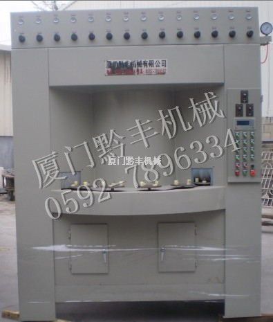 自動轉(zhuǎn)盤式噴砂機(jī)1出2